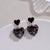 Cocoa Yacht Club Black Heart-Shaped Earrings