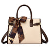 Cocoa Yacht Club Leather Embossed Snakeskin Handbag