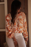 Orange Floral Print Knotted Backless Long Sleeve Blouse