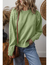  Eyelet Round Neck Long Sleeve Sweatshirt.