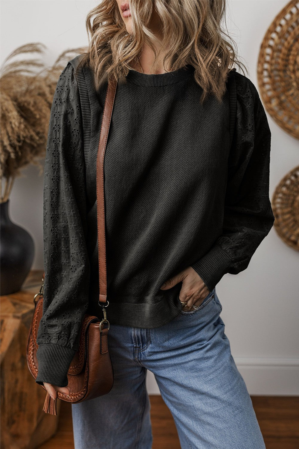  Eyelet Round Neck Long Sleeve Sweatshirt.