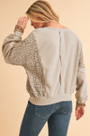 Parchment Crochet Patchwork Exposed Seam Ribbed Trim Sweatshirt