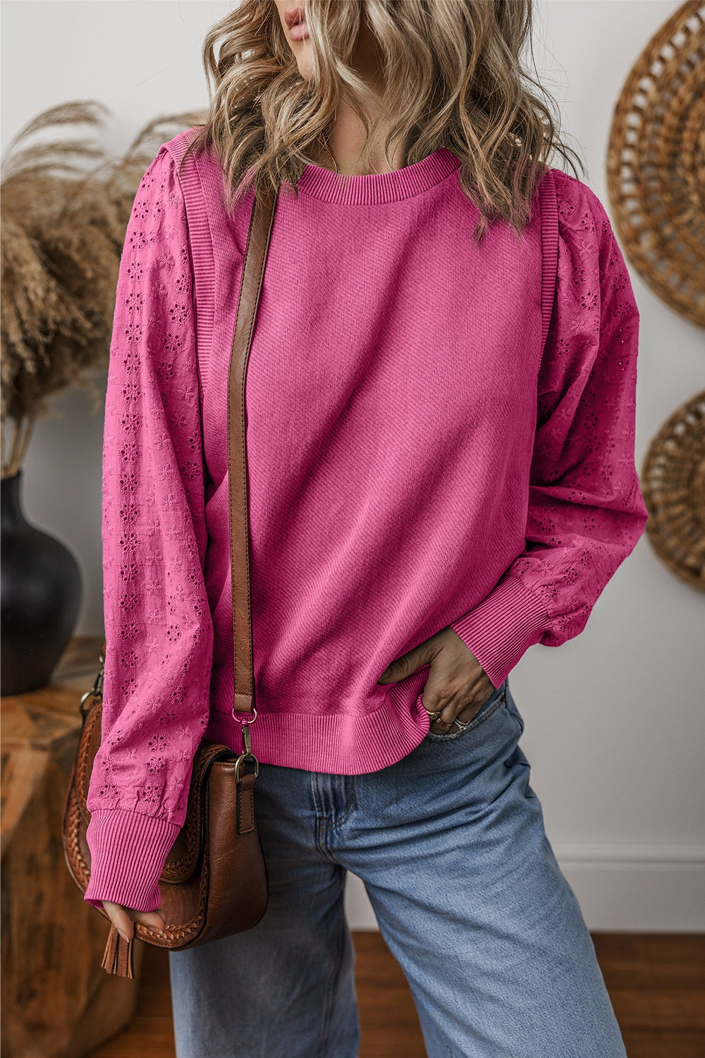  Eyelet Round Neck Long Sleeve Sweatshirt.