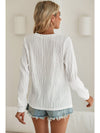 Apricot Wavy Textured Solid Color Drop Shoulder Pullover Top