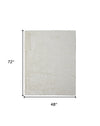 5' X 8' Ivory Shag Power Loom Stain Resistant Area Rug
