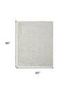 5' X 8' Ivory Shag Power Loom Stain Resistant Area Rug