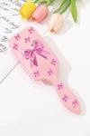 Gossamer Pink Bowknot Print Hair Cushion Comb