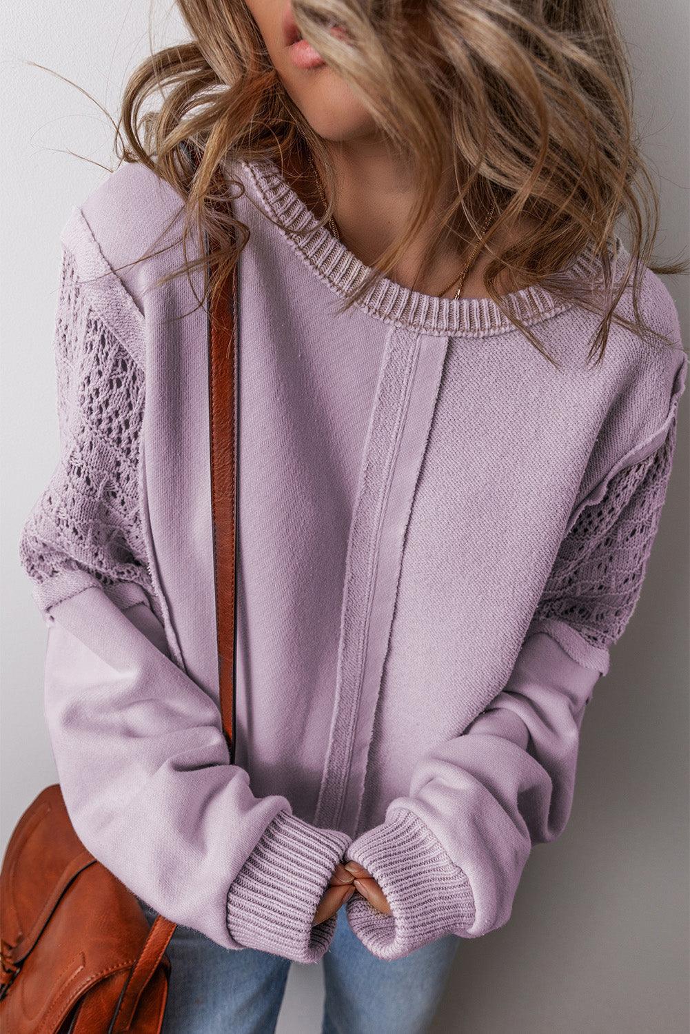 Sweatshirts & Hoodies Orchid Petal Crochet Patchwork Exposed Seam Ribbed Trim Sweatshirt.