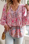 Blouses Pink Boho Floral Print Lace Up V Neck Smocked Sleeve Blouse.