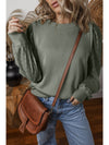  Eyelet Round Neck Long Sleeve Sweatshirt.