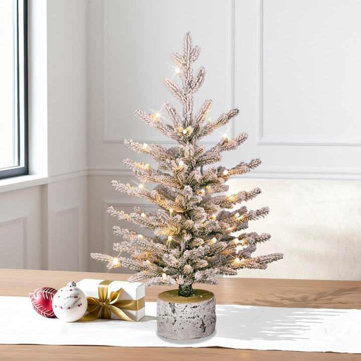 International 4.5ft Pre-Lit Potted Flocked Arctic Fir Christmas Tree