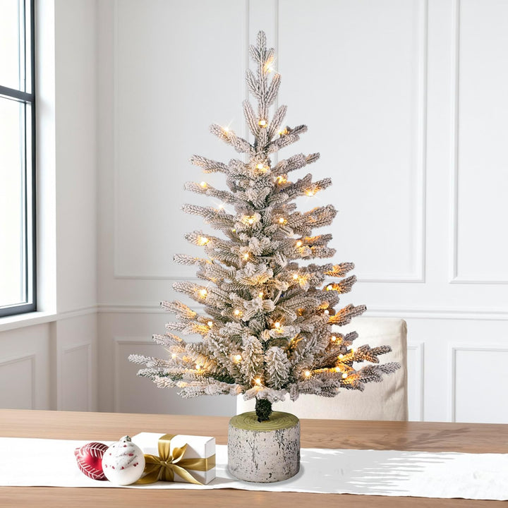 International 4.5ft Pre-Lit Potted Flocked Arctic Fir Christmas Tree