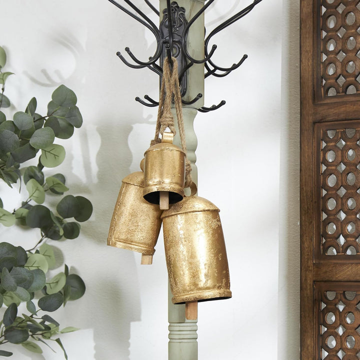 Deco 79 Gold Metal Tibetan Inspired Decorative Giant XL Cow Bells