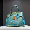 Cocoa Yacht Club Leather Snake Print Handbag