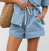 Light blue denim shorts