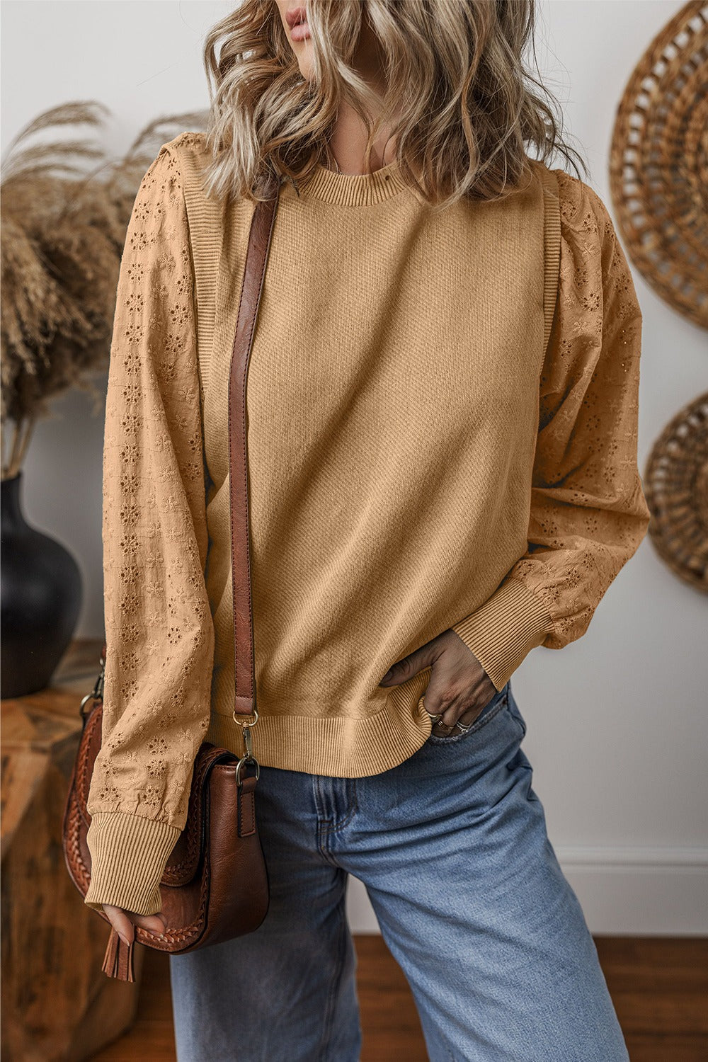  Eyelet Round Neck Long Sleeve Sweatshirt.