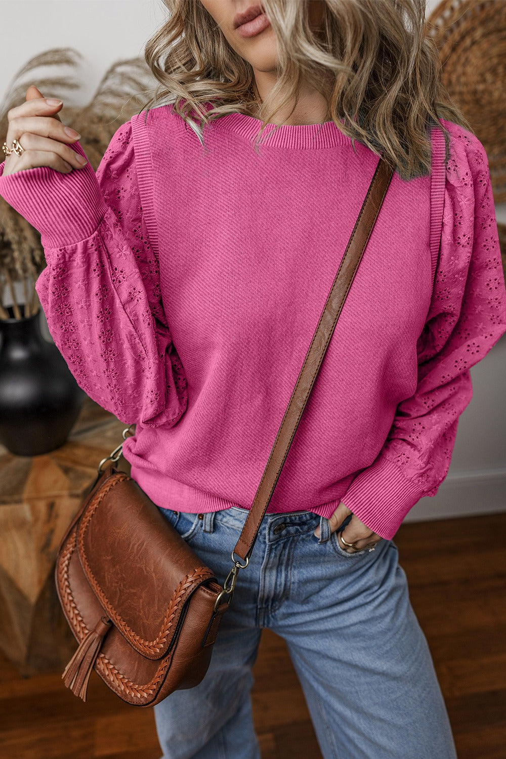  Eyelet Round Neck Long Sleeve Sweatshirt.