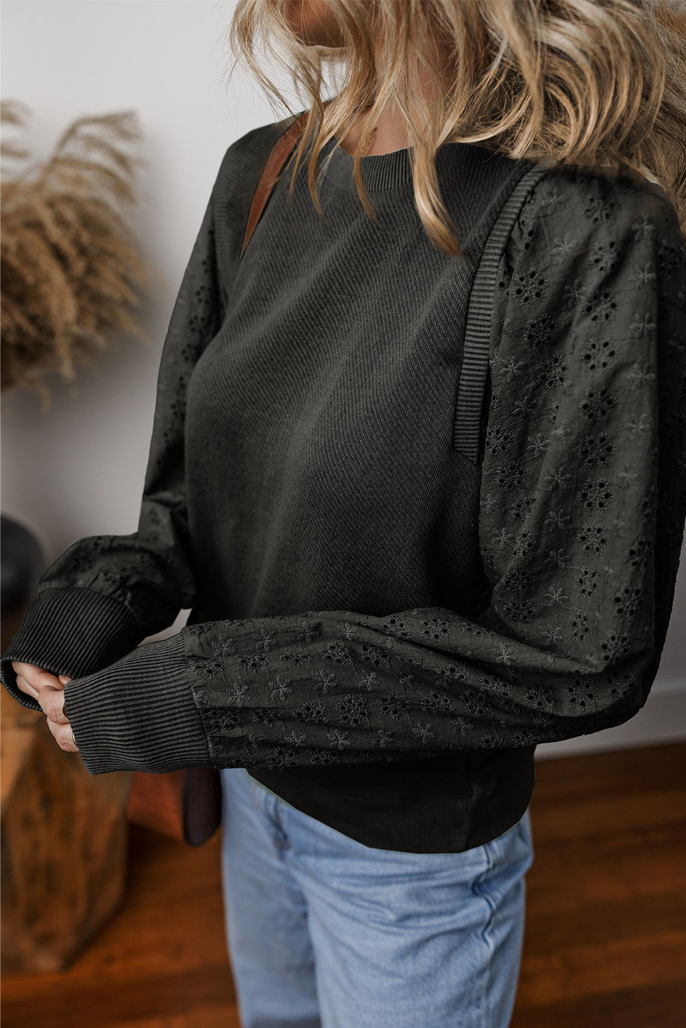  Eyelet Round Neck Long Sleeve Sweatshirt.