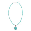 Carved Blue Turquoise and Sterling Silver Pendant