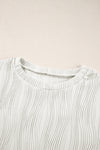 Apricot Wavy Textured Solid Color Drop Shoulder Pullover Top